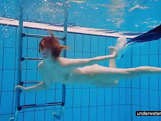 Teen Girl Avenna Is Swimming In The Pool free video
